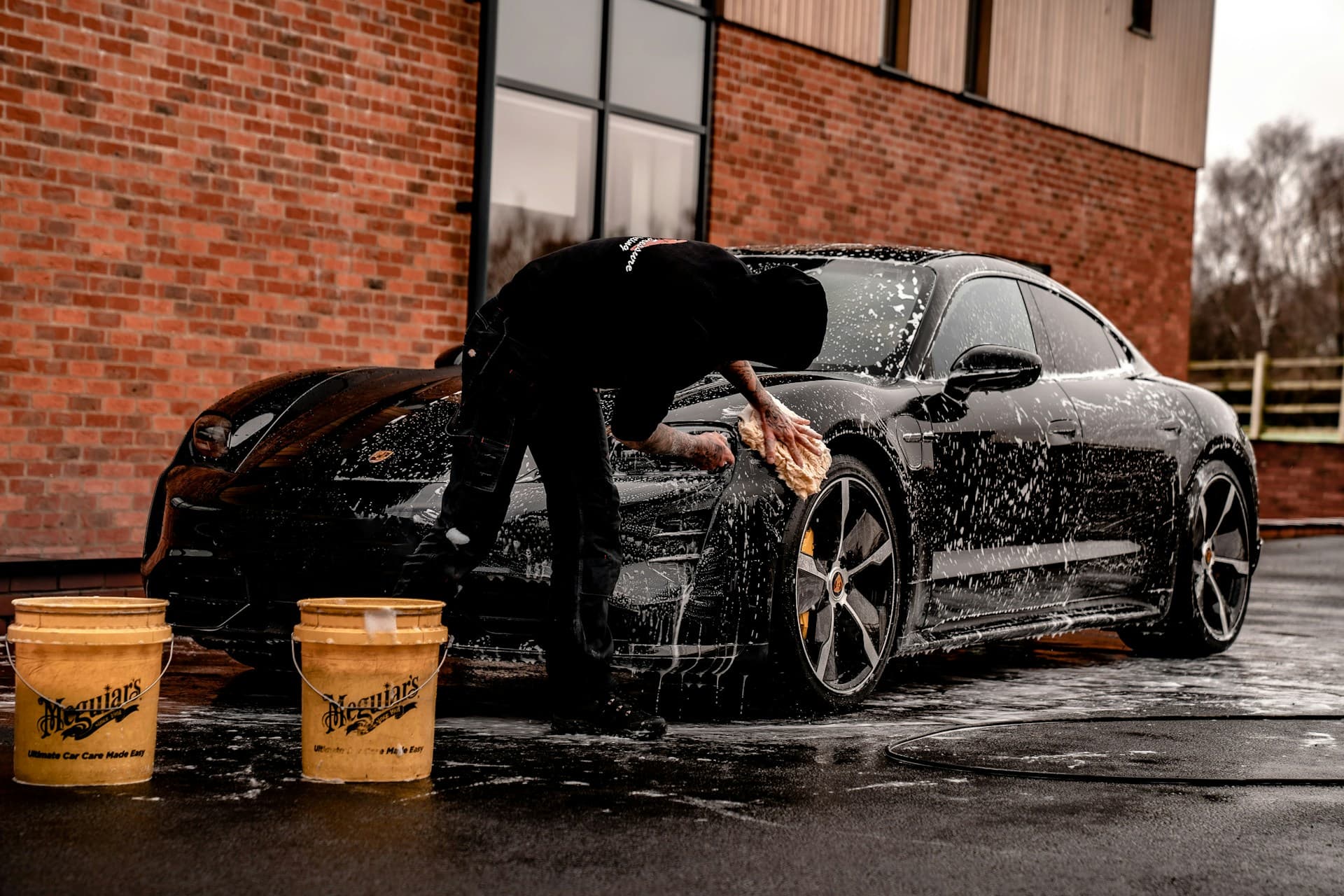 Car being cleaned by a professional service